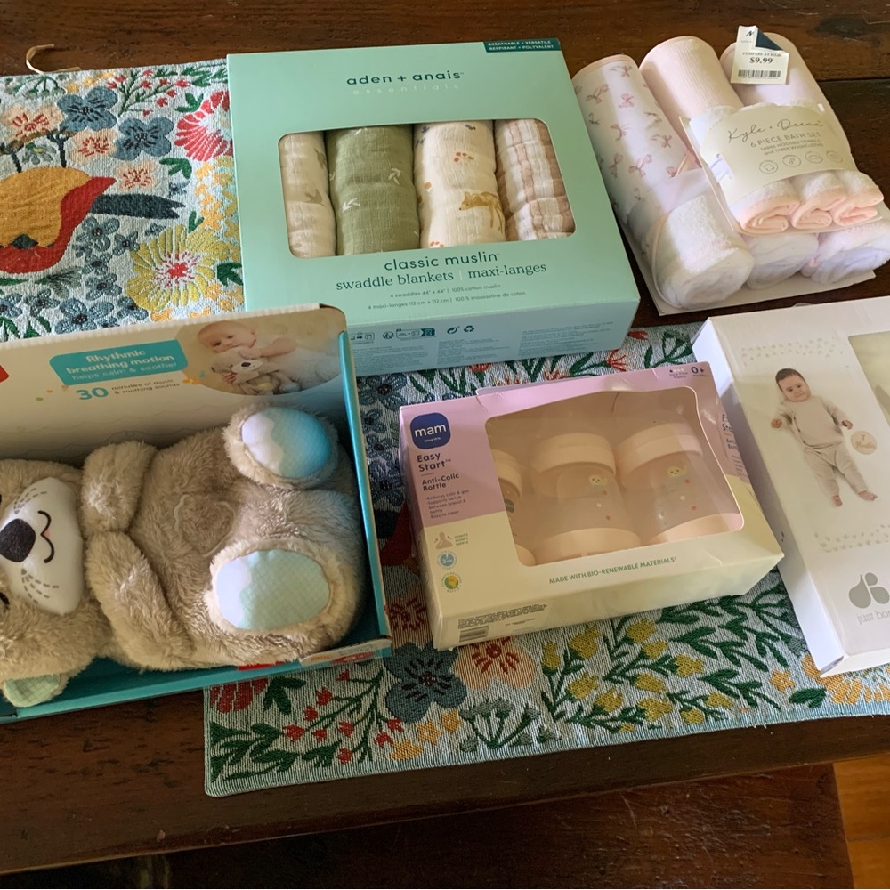 New baby bundle—muslin blankets, baby bottles, otter with heartbeat